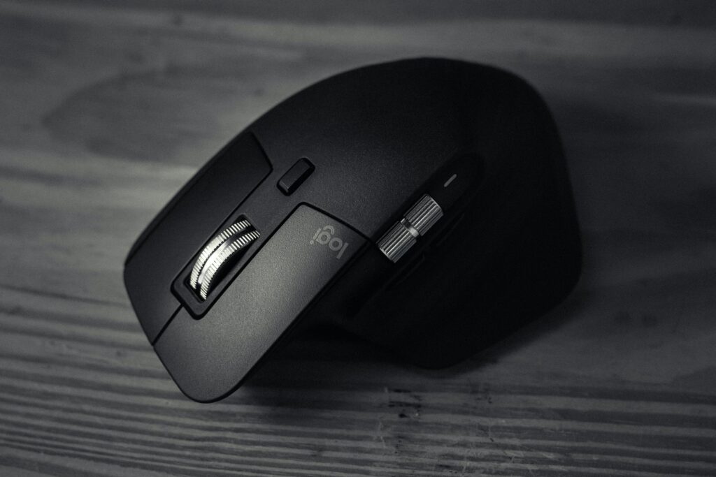 Logitech wireless gaming mouse with black in color and side cursor.